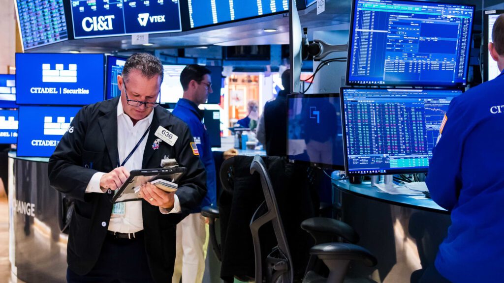 Fund managers are betting on stocks despite ai bubble risks
